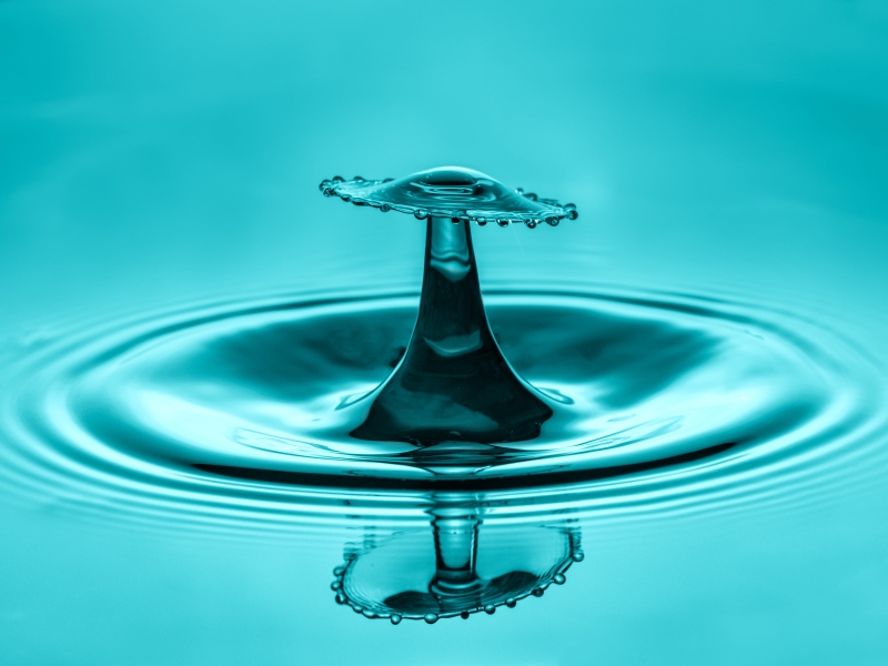 water-drop-collision-with-abstract-blue-effect